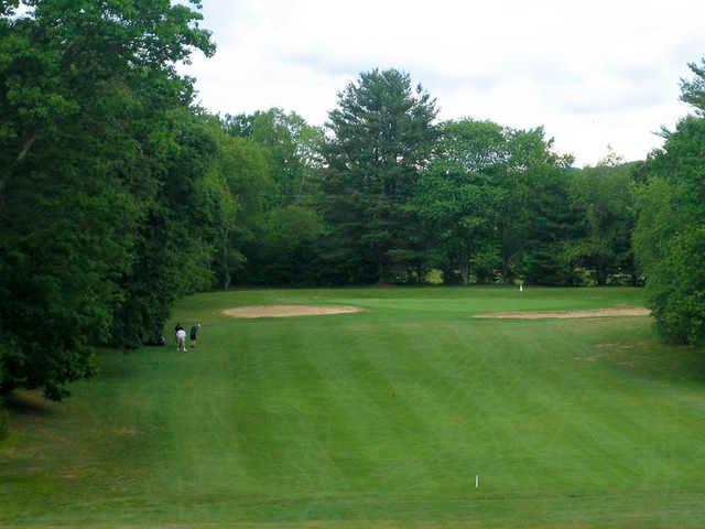 A view of a green guarded by bunkers at Chanticlair Golf Club