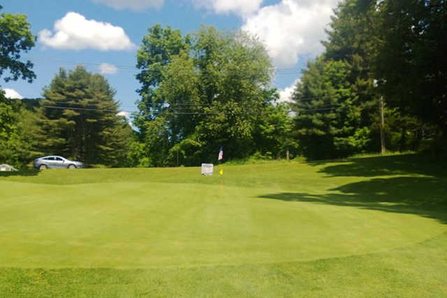 A view of a green at Hop Brook Golf Course