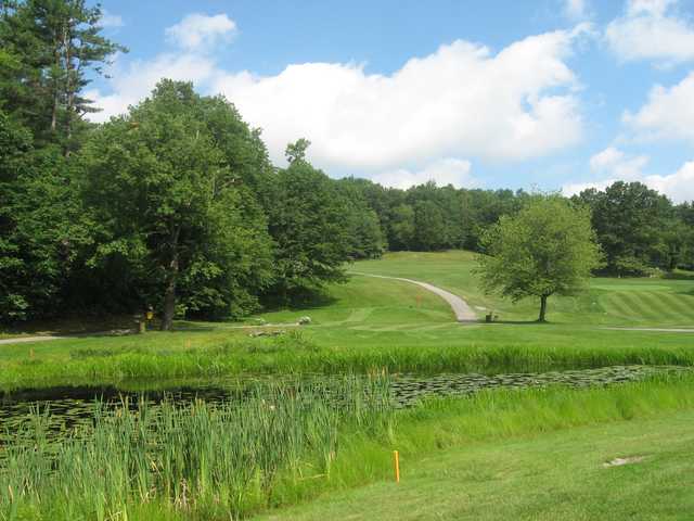 A sunny day view over a pond from Berlin Country Club