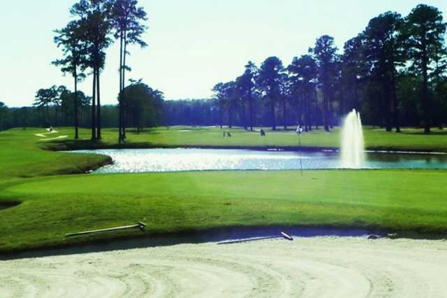 A view of a green with water coming into play from The Pines at Elizabeth City