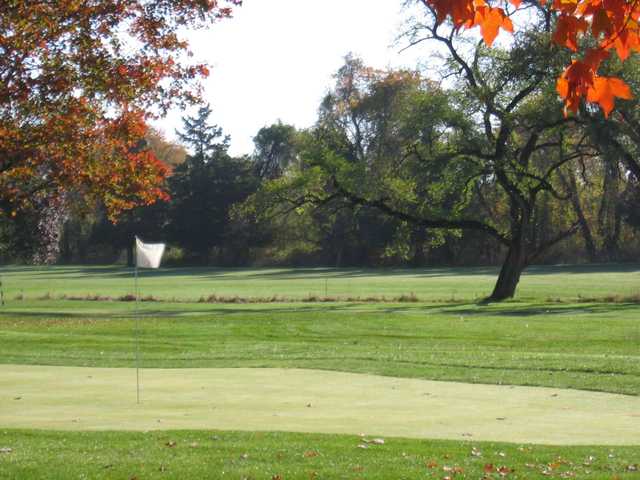 A fall view of a green at Spring Meadow Golf Course