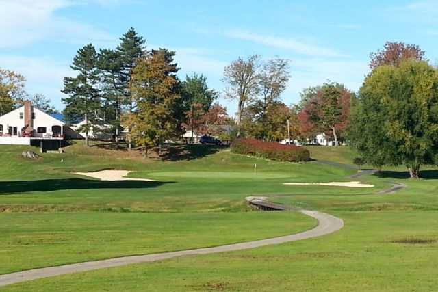A view of a green flanked by bunkers at Geneva-on-the-Lake Golf Course