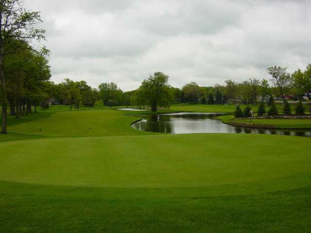 A view of a green with water coming into play at Bay Pointe Golf Club