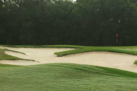 A view of a hole protected by tricky bunkers at Legacy Hills Golf Club