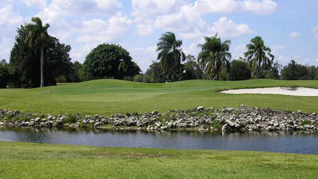 A view of a green with water coming into play at Orangebrook Country Club