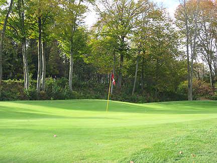 A view of a green at Ash Brook Golf Club