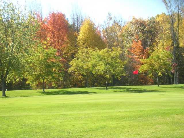 A sunny view of hole #11 at Wicker Hills Golf Course
