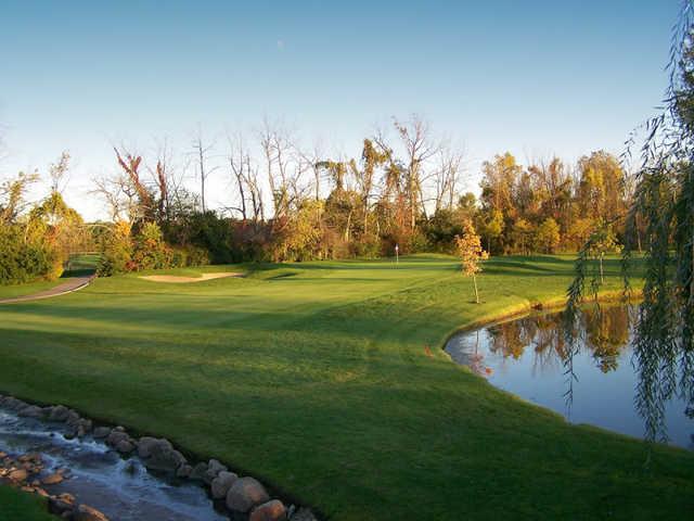 A view of a green surrounded by water at Tanglewood - The Lion Golf Club - South Course