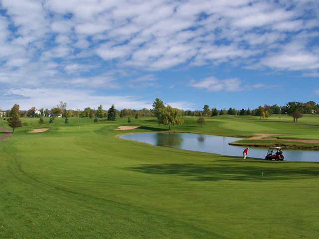 A view of a green surrounded by water at Tanglewood - The Lion Golf Club - North Course
