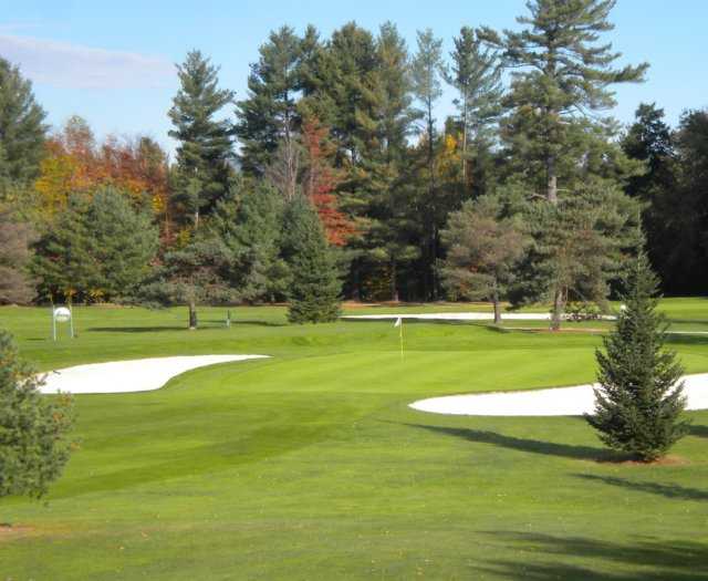 A view of the 5th hole flanked by sand traps at Copley Country Club