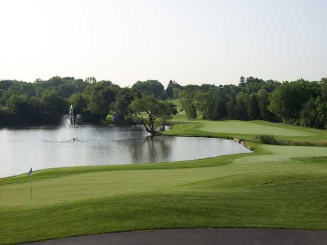 A view of a green with water coming into play at Steeple Chase Golf Club