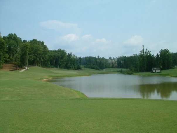 A view of green #8 surrounded by water at Chestatee Golf Club