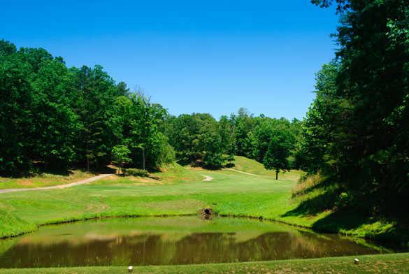 A view of hole #11 surrounded by water at Innsbruck Golf Club