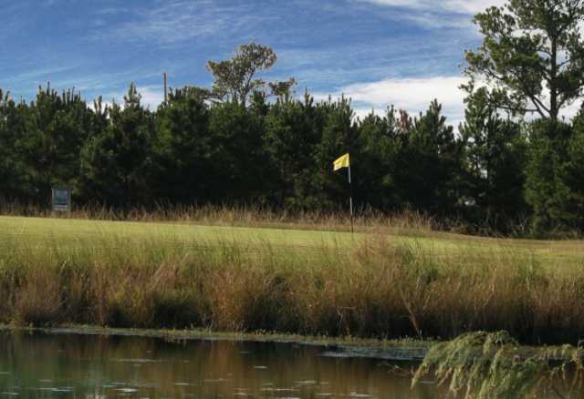 A view over the water of green #8 at Craig Golf Course