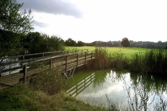 A view of a green with water coming into play at Vexin Course from Ableiges Golf Club