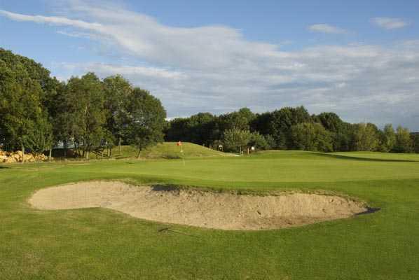 A view of the 13th green at Forges les Bains Golf Course