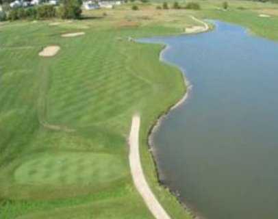 Aerial view of green #11 and fairway surrounded by water at Kestrel Ridge Golf Club