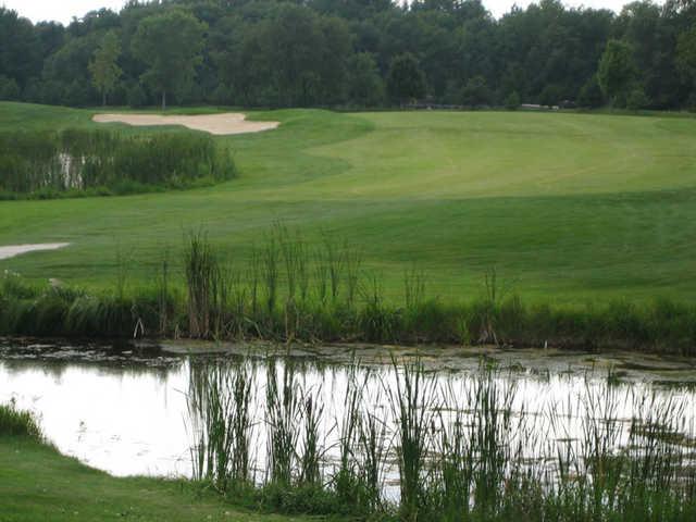 A view from the 14th tee surrounded by water at Kettle Moraine Golf Club