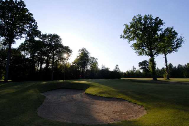 A sunny day view of a hole at Chantilly Golf Club