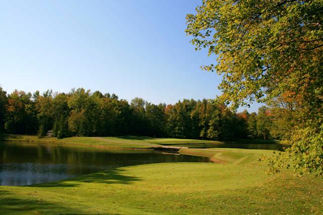 The fifth hole at Winding Hollow is a par 3 guarded by water in front and to the right