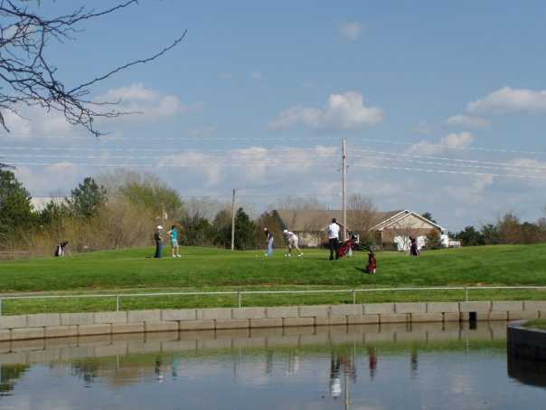 A view over the water of green #11 at Turkey Creek Golf Course