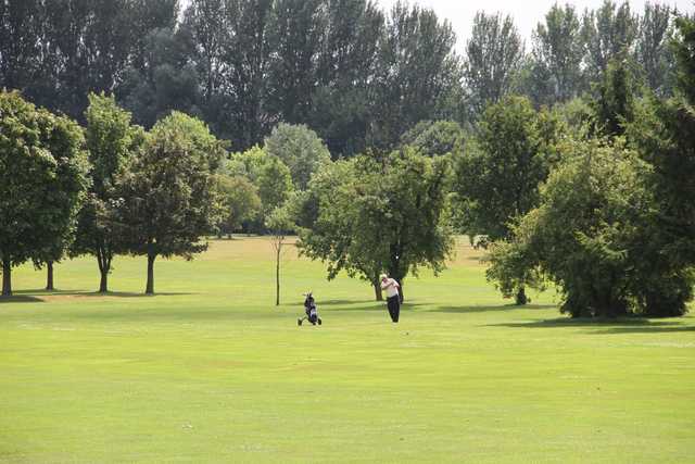 A sunny day view of a fairway at Cheshunt Park Golf Centre
