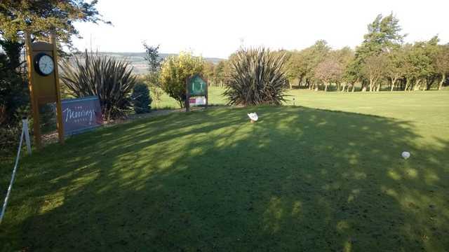 The 1st tee and clock at Ravensworth Golf Club
