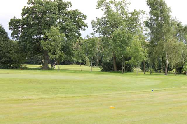 Beautiful view of the 5th hole and surrounding trees at Gatley Golf Club