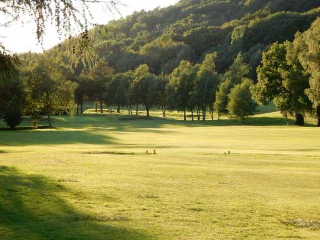 Scenic view from the fairway and the surrounding trees at Glossop & District Golf Club