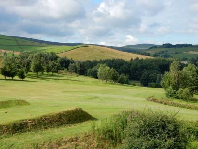 A scenic view from the course of the rolling countryside at Glossop & District Golf Club