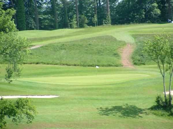 View of the 2nd green at Coed-y-Mwstwr Golf Club