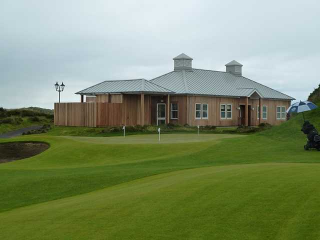 A view of the clubhouse and the putting green at McDonald Golf Club