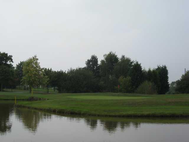 View over the pond of he 16th green at Oakridge Golf Club