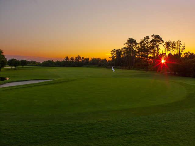 Sunrise view of the 6th green at The Pointe Golf Club