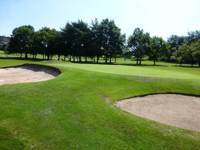 The 12th green and greenside bunkers at Marple Golf Club 