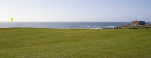 Superb green with the coast in the background at Newquay GC