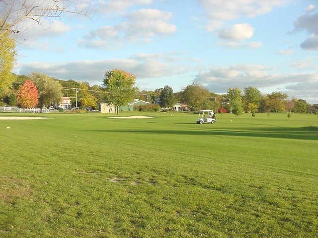 A view from Chapel Hill Golf Course with a golf cart in background