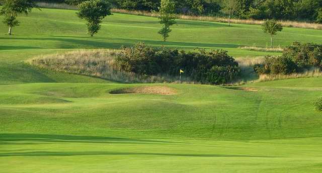 Tough golf on the 5th at Harwood GC