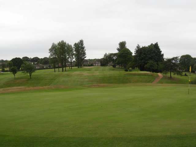 Beautiful view of the 3rd green and second hole at Harwood Golf Club 