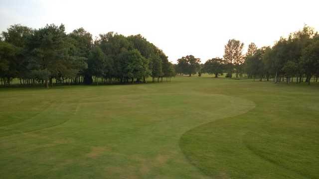 View of the tree lined 1st fairway at Shrewsbury Golf Club