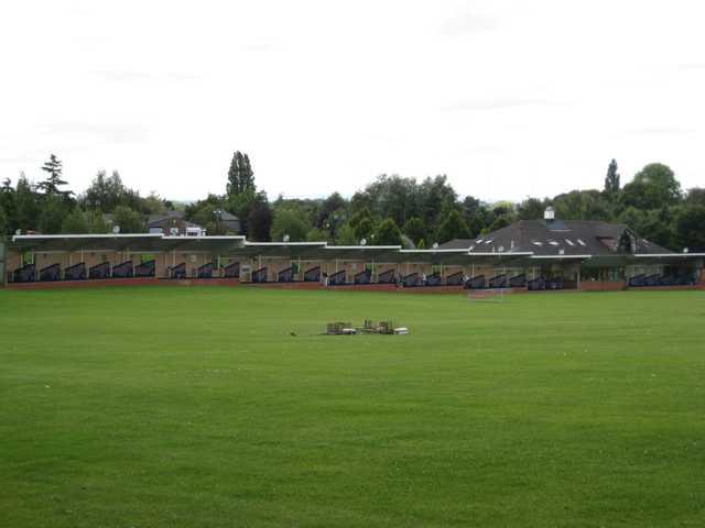 A view of the large driving range and back of the clubhouse at Bromsgrove Golf Centre