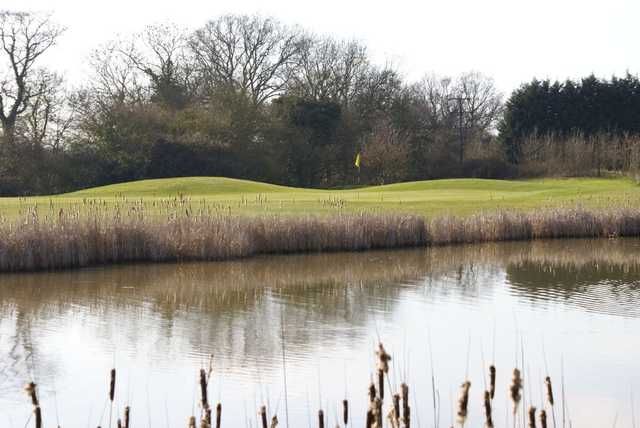 Inviting water protecting the 13th green from Nazeing Golf Club