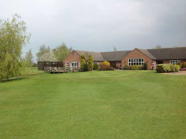 The Six Hills clubhouse overlooking the course and putting green