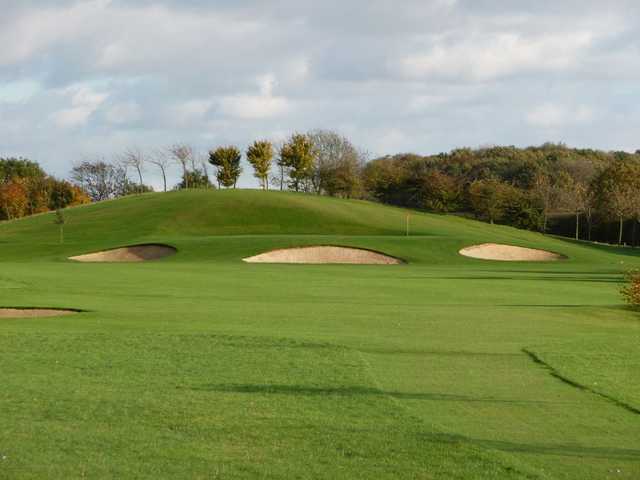 Bunkers protecting the green at Six Hills Golf Club