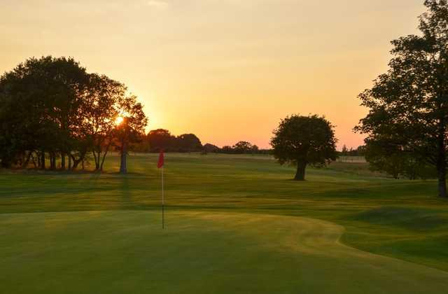 The sun setting over the beautiful 9th hole at Chippenham Golf Club 