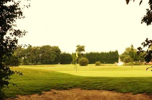 Adjacent to the 6th green is one of the lakes found at Horne Park Golf Club.