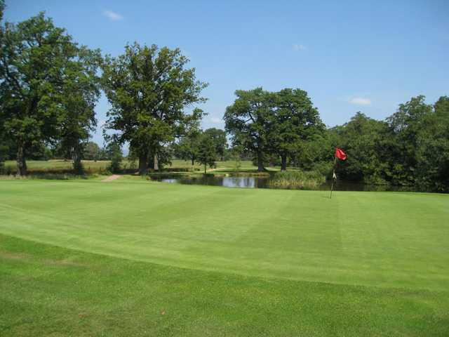 The 7th green and pond at Henlle Park Golf Club