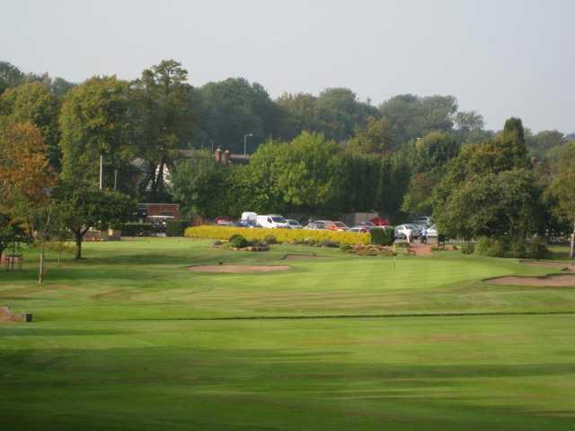 Scenic view of the 18th green and surrounding bunkers at Walsall Golf Club 