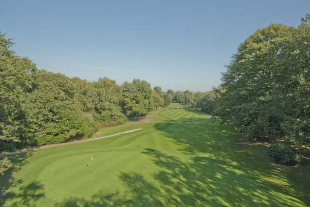 Manicured greens and tree lined fairways as seen at the 5th hole at Silvermere.