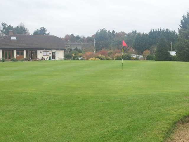 A greenside view of the clubhouse at Playgolf Abbey Moor